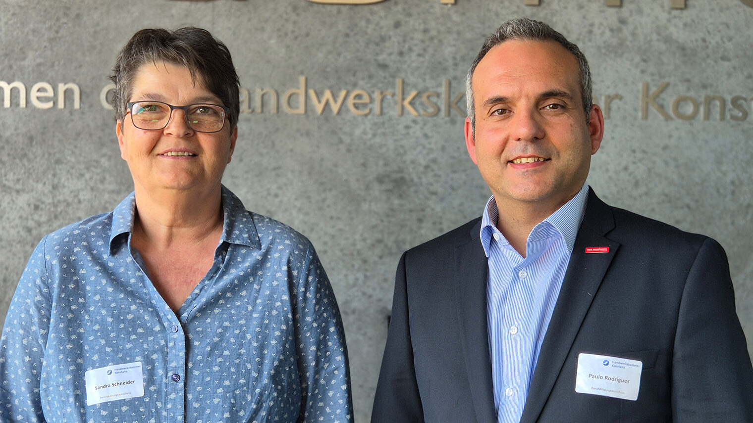 Portrait der alternierenden Vorsitzenden des Berufsbildungsausschusses Sandra Schneider (Arbeitnehmer) und Paolo Rodrigues (Arbeitgeber).